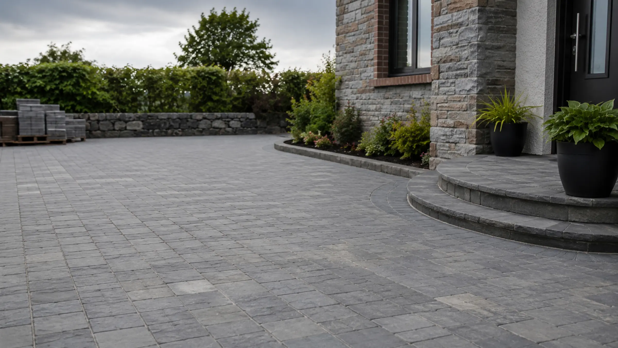 A finished block paving driveway outside an Irish home