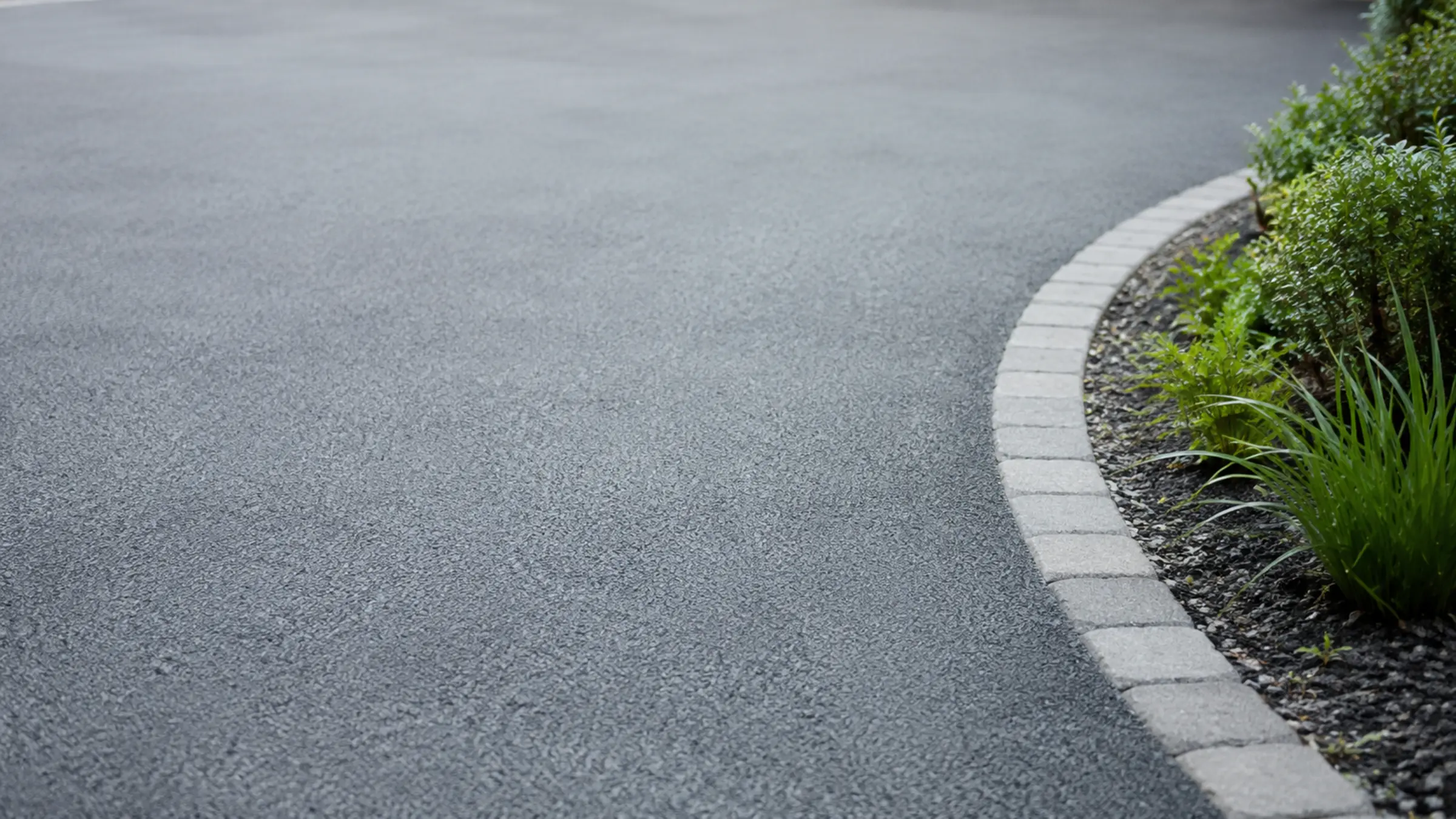 A quiet residential street of Irish homes with paved driveways